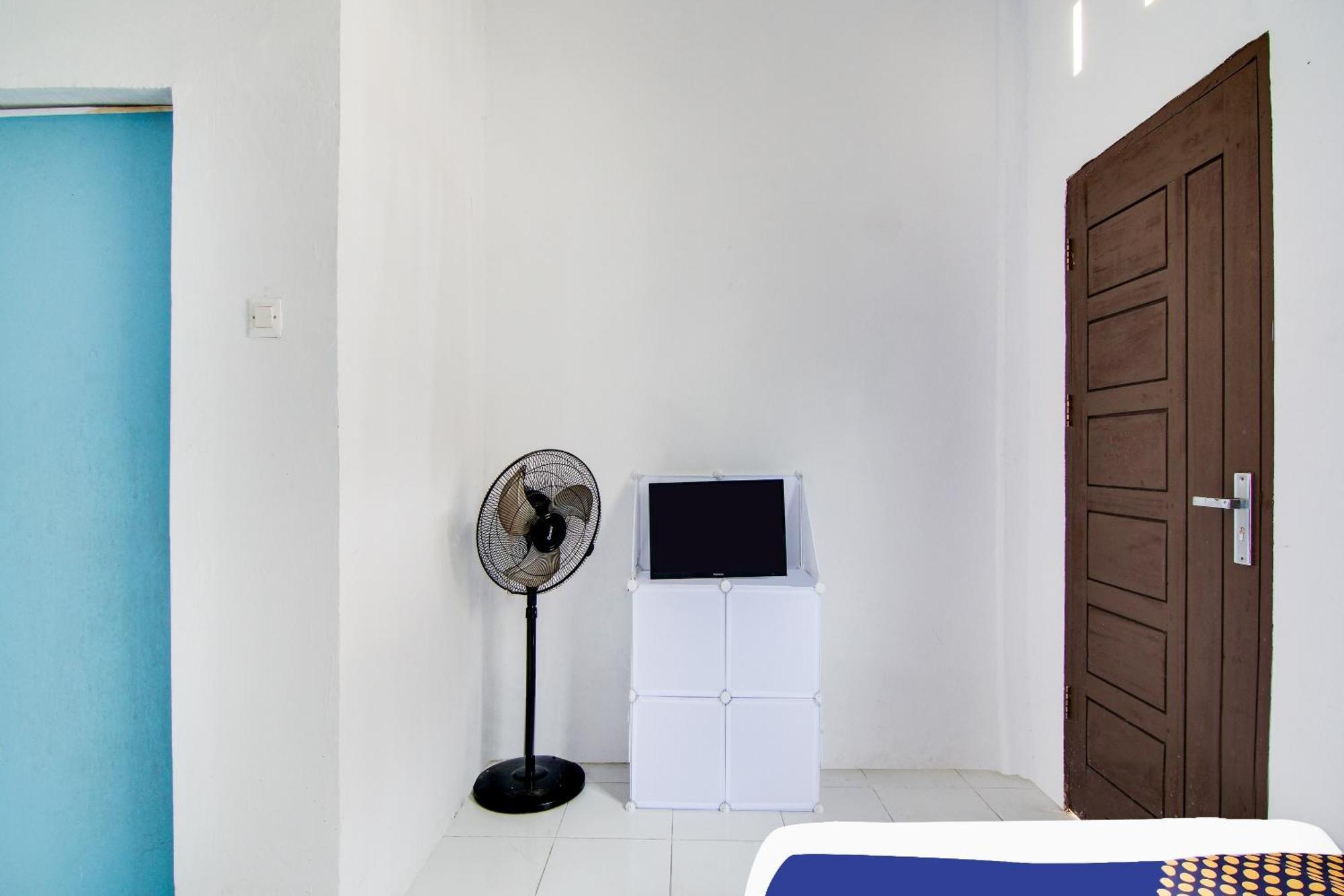 Spot On 91858 Raja Homestay Syariah Pekanbaru Bagian luar foto