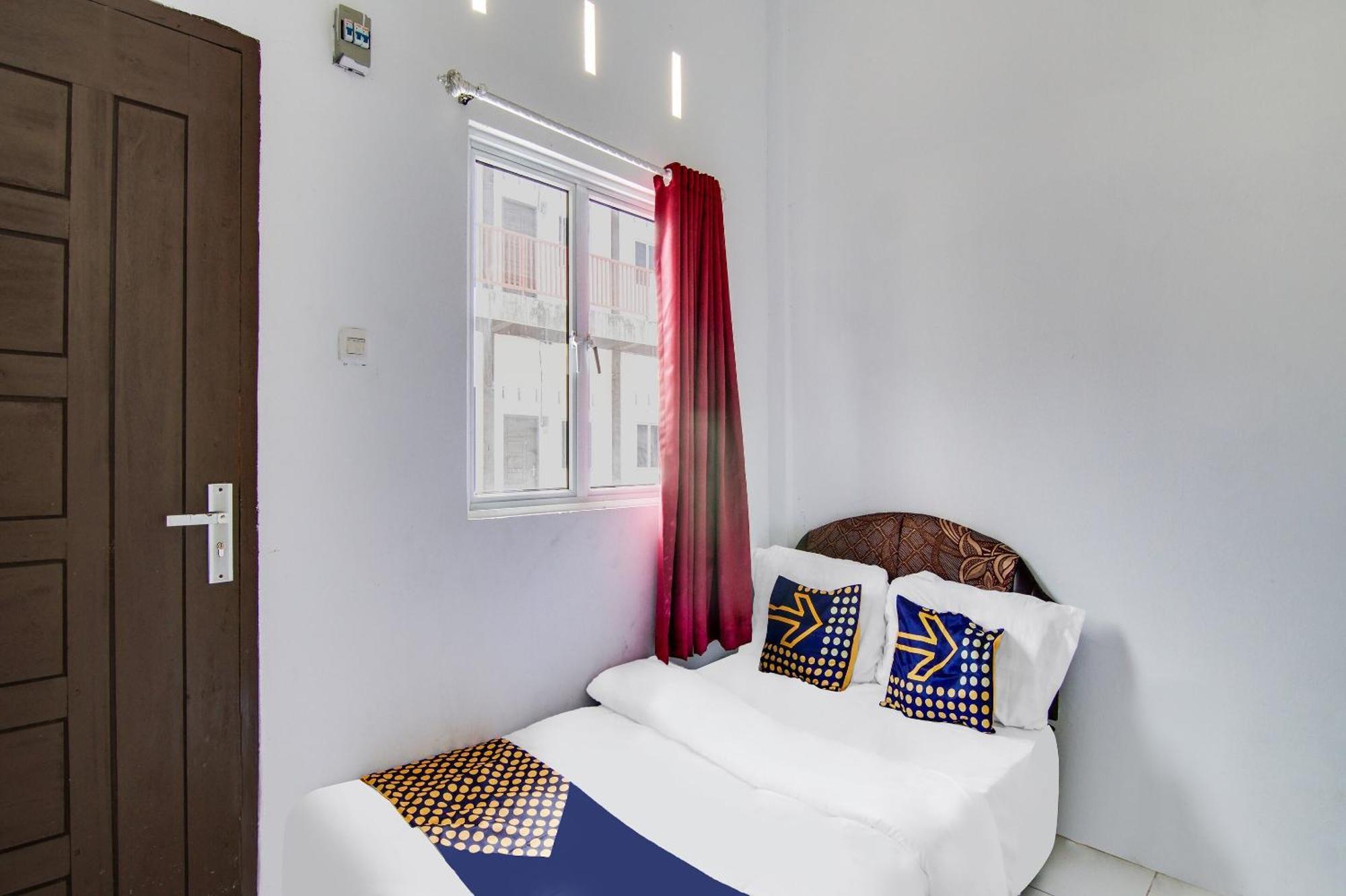 Spot On 91858 Raja Homestay Syariah Pekanbaru Bagian luar foto