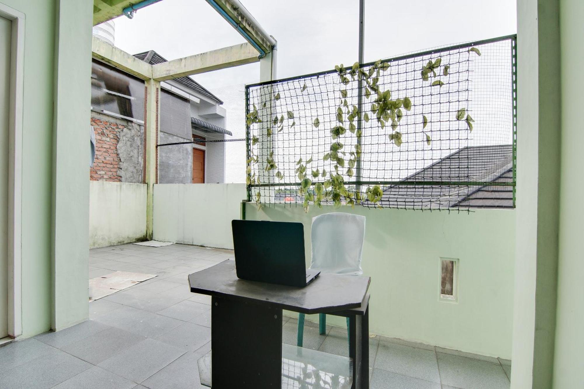 Spot On 91858 Raja Homestay Syariah Pekanbaru Bagian luar foto