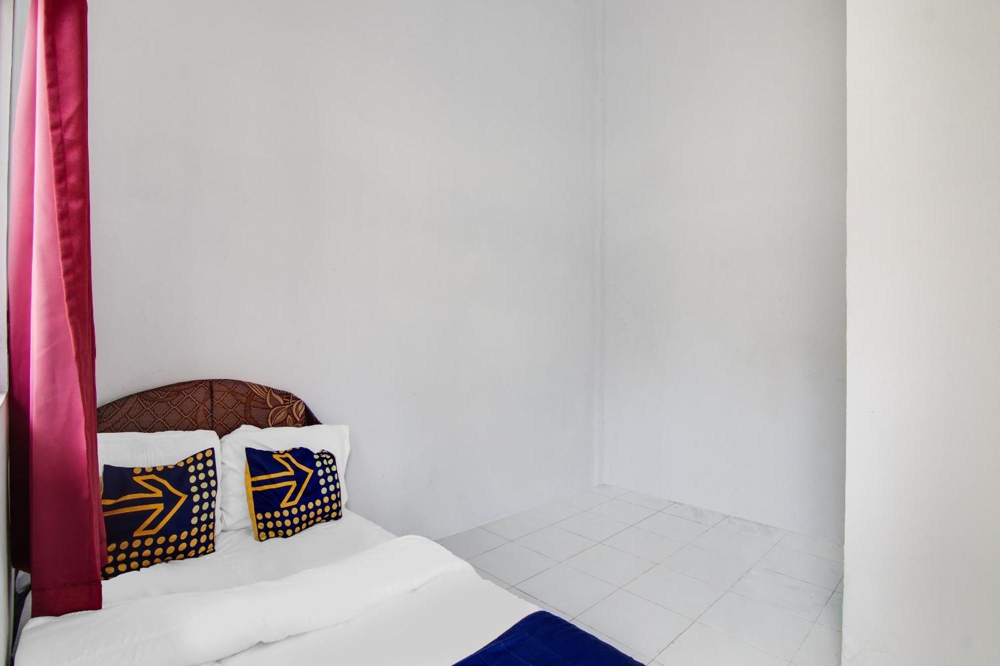 Spot On 91858 Raja Homestay Syariah Pekanbaru Bagian luar foto