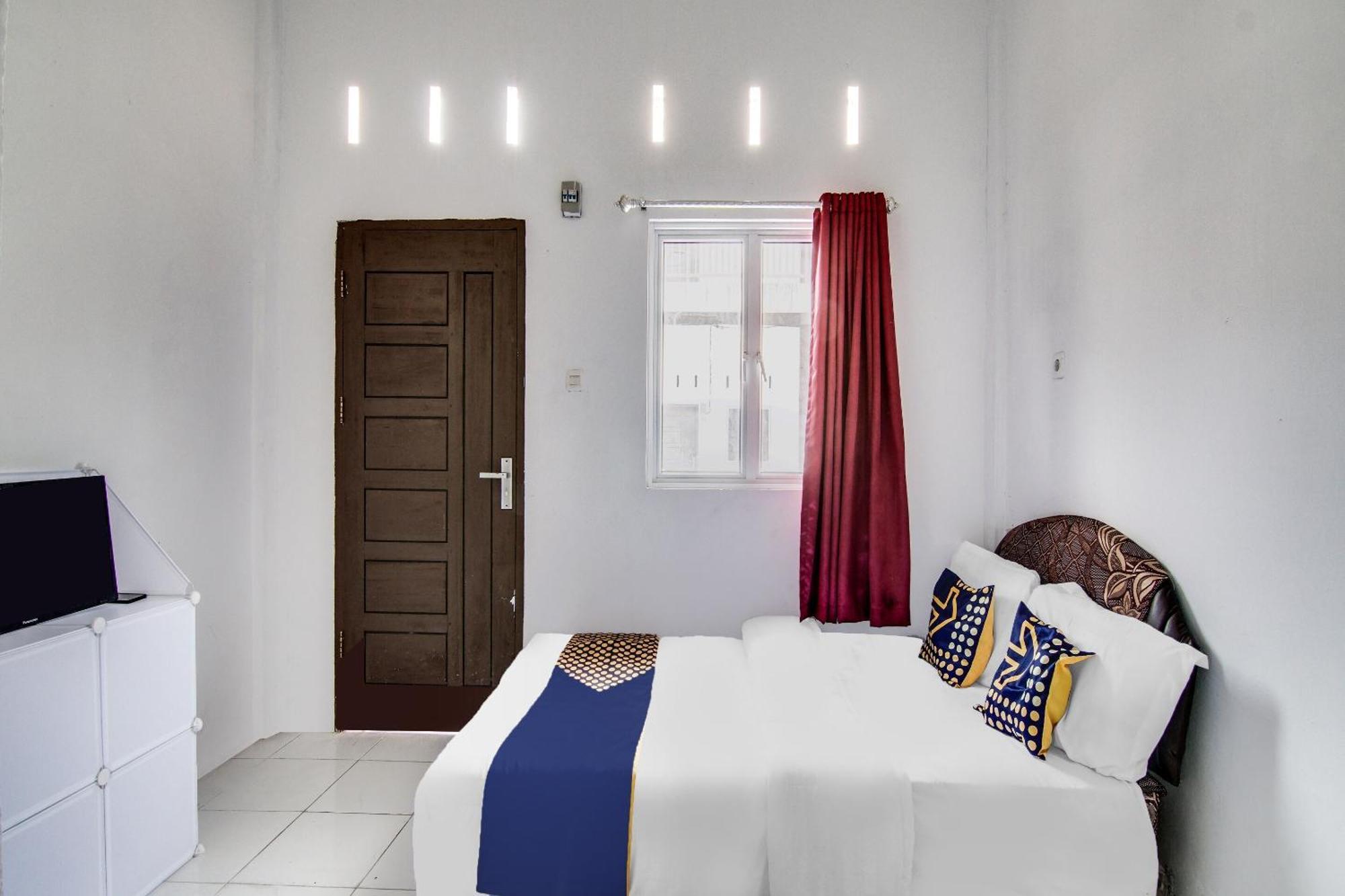 Spot On 91858 Raja Homestay Syariah Pekanbaru Bagian luar foto