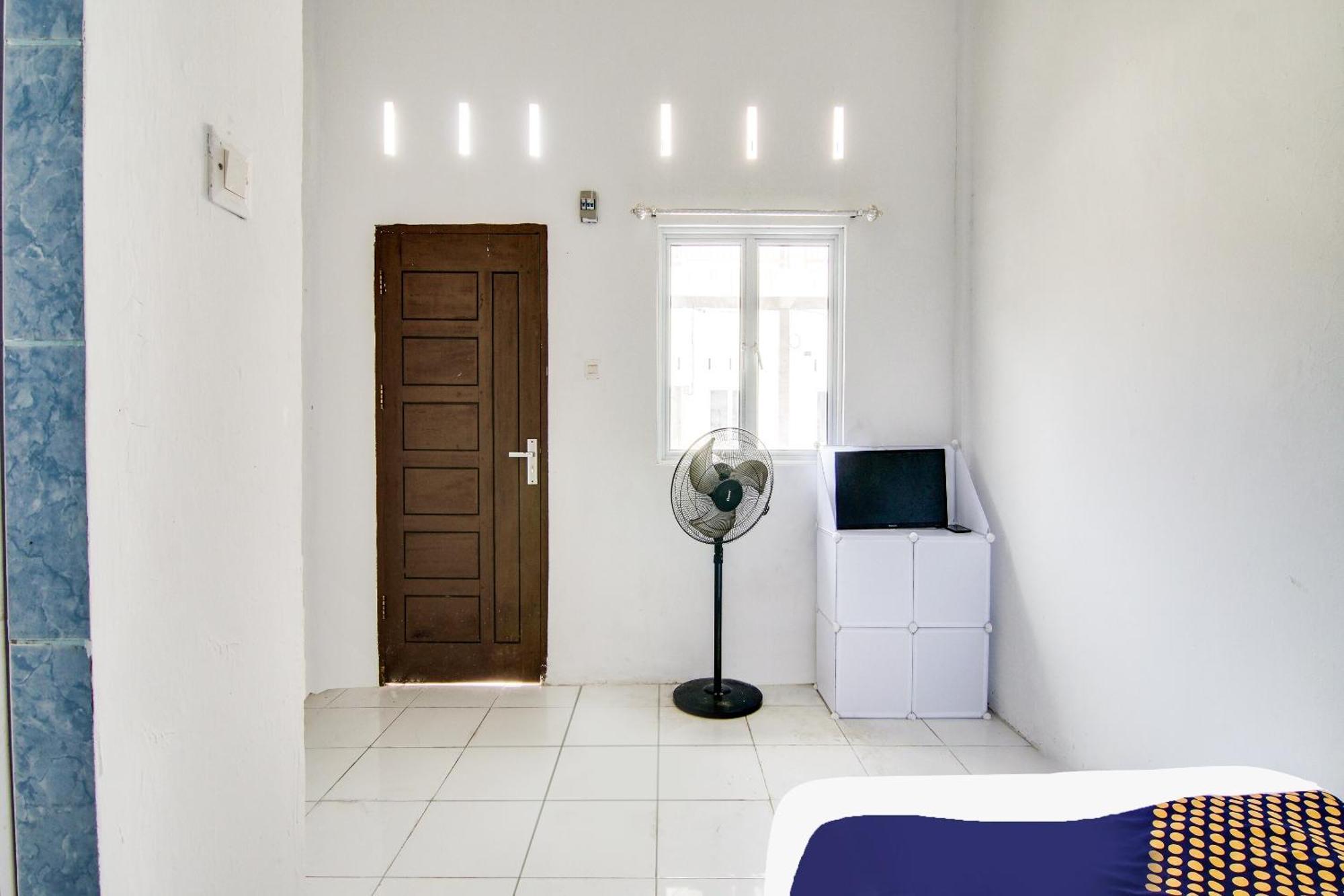 Spot On 91858 Raja Homestay Syariah Pekanbaru Bagian luar foto