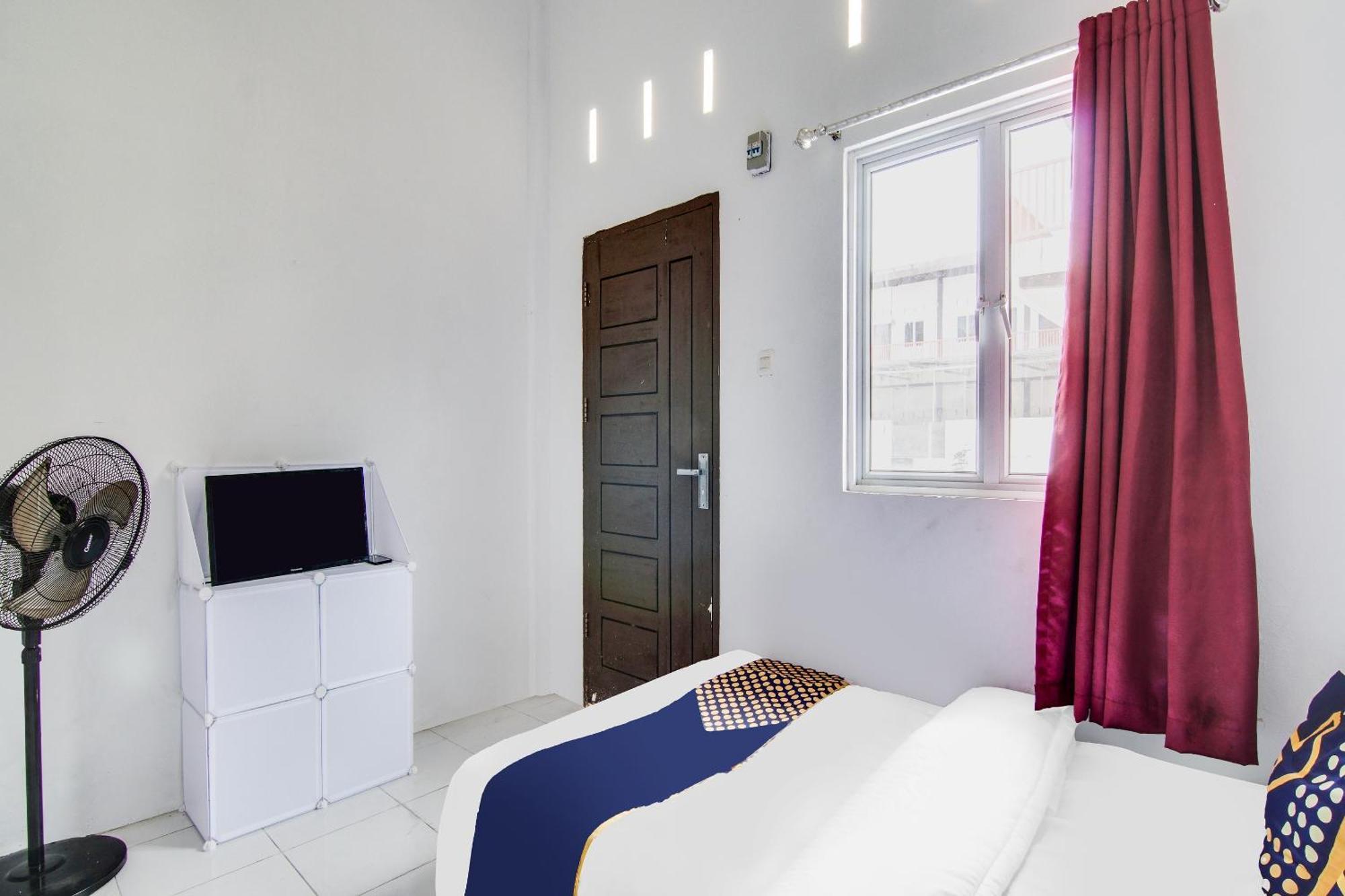 Spot On 91858 Raja Homestay Syariah Pekanbaru Bagian luar foto