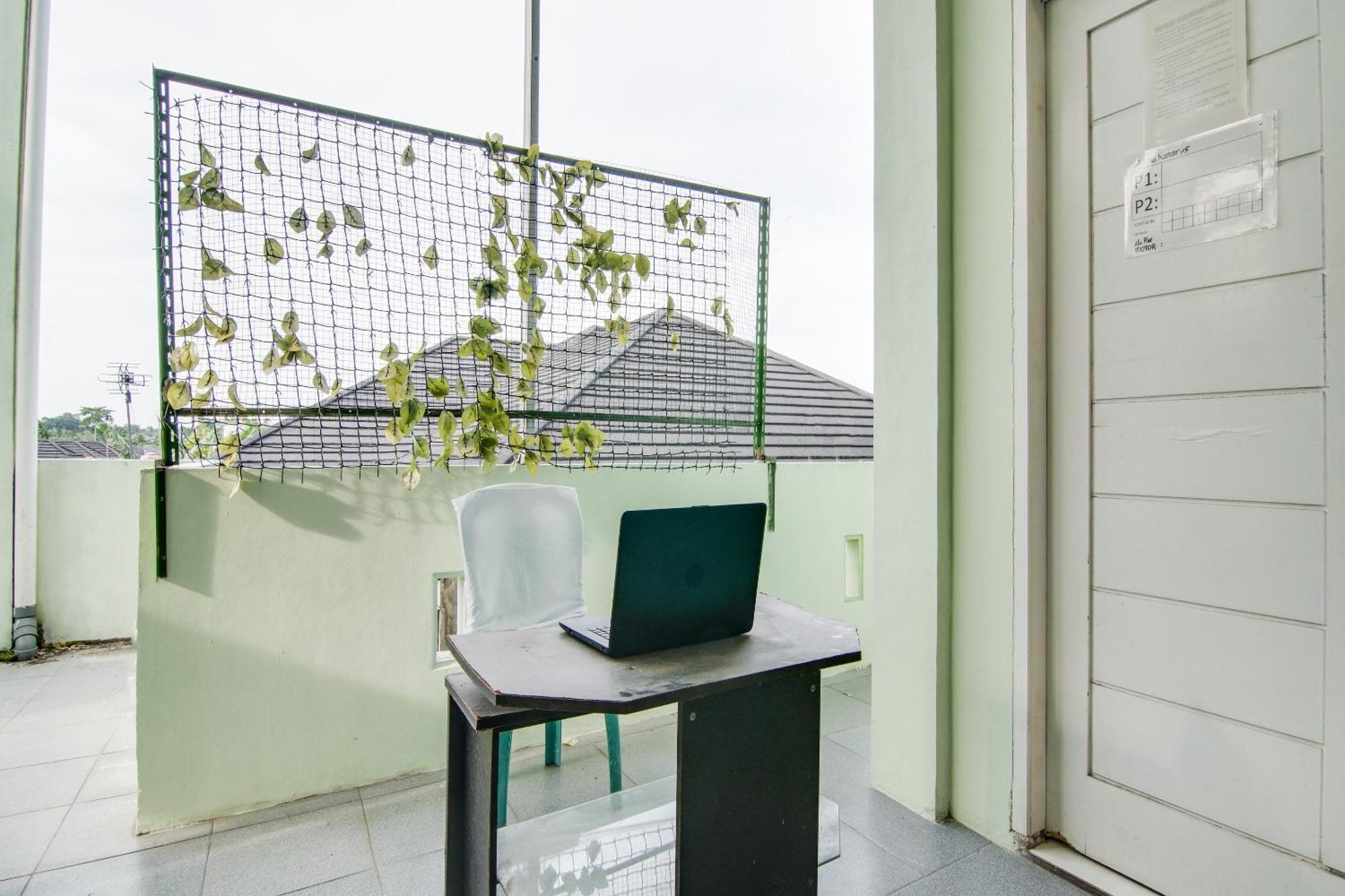 Spot On 91858 Raja Homestay Syariah Pekanbaru Bagian luar foto