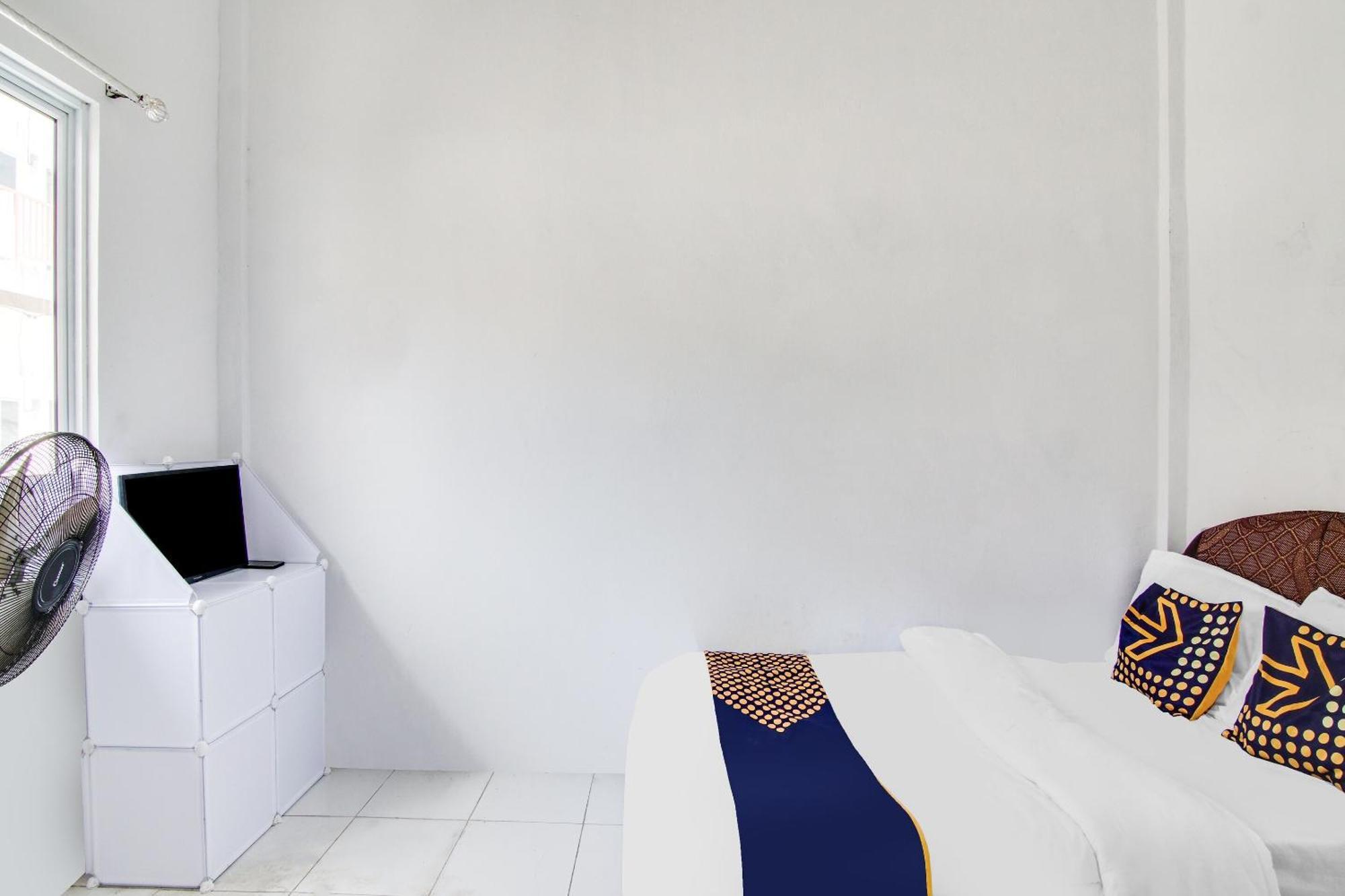 Spot On 91858 Raja Homestay Syariah Pekanbaru Bagian luar foto